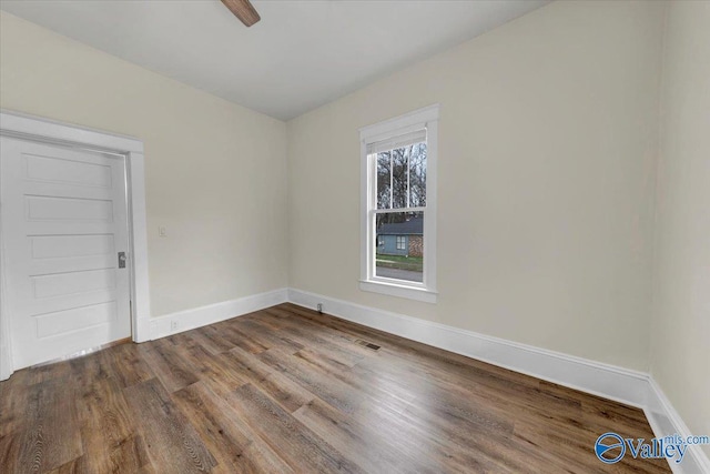 empty room featuring hardwood / wood-style floors