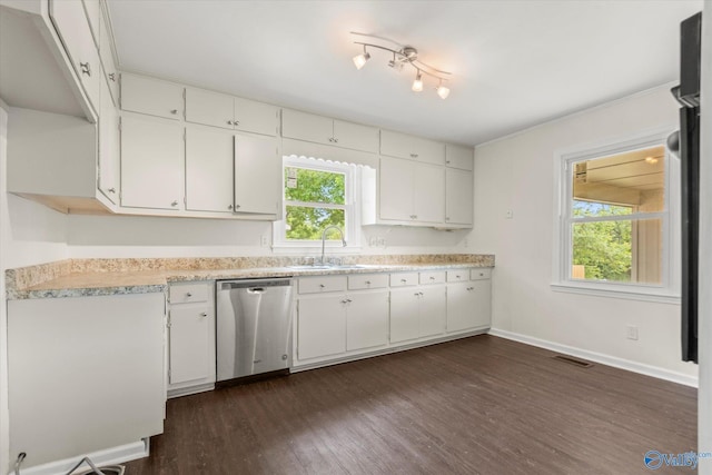 605 Holland Dr SW, Decatur, AL 35601 - kitchen featuring dishwasher, a sink, light countertops, white cabinetry, and dark wood-type flooring