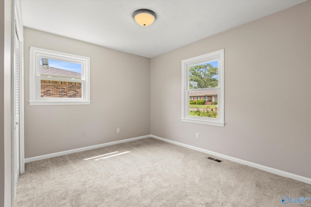 605 Holland Dr SW, Decatur, AL 35601 - carpeted spare room featuring baseboards
