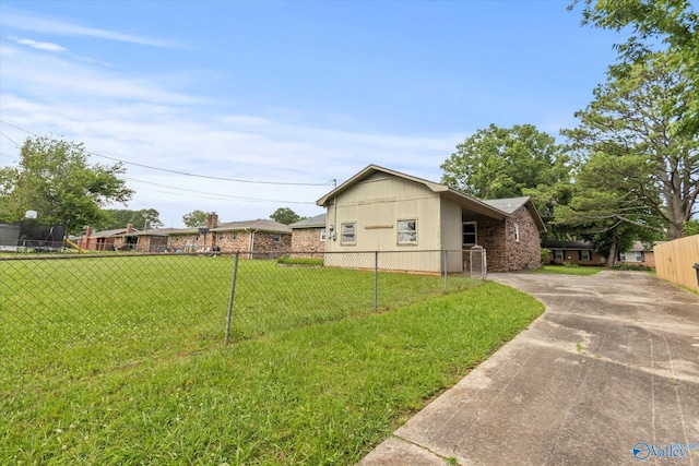 605 Holland Dr SW, Decatur, AL 35601 - view of home's exterior featuring concrete driveway