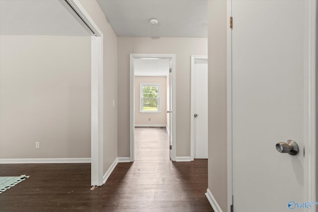 605 Holland Dr SW, Decatur, AL 35601 - hall featuring dark wood-style floors and baseboards