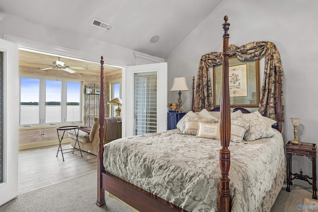 6468 Turtle Bay Way E, Athens, AL 35611 - bedroom with a water view, lofted ceiling, and wood finished floors