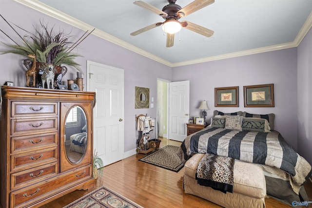 6468 Turtle Bay Way E, Athens, AL 35611 - bedroom featuring light wood-style floors, ornamental molding, ceiling fan, and baseboards