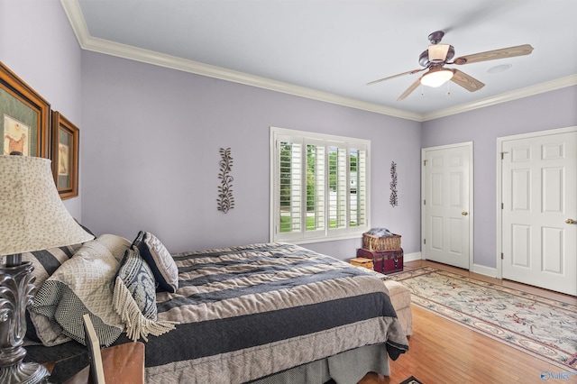 6468 Turtle Bay Way E, Athens, AL 35611 - bedroom with ornamental molding, wood finished floors, baseboards, and a ceiling fan