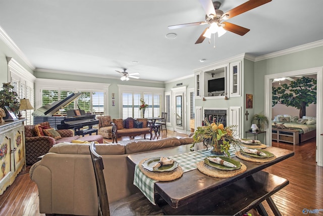 6468 Turtle Bay Way E, Athens, AL 35611 - living room with ceiling fan, crown molding, hardwood / wood-style flooring, and a fireplace