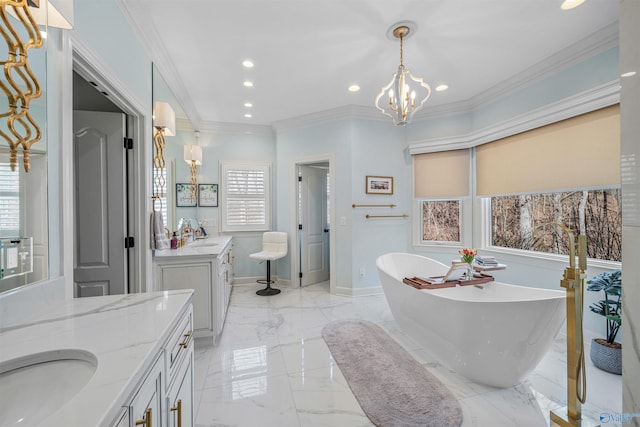 full bathroom with two vanities, marble finish floor, recessed lighting, baseboards, and a freestanding bath