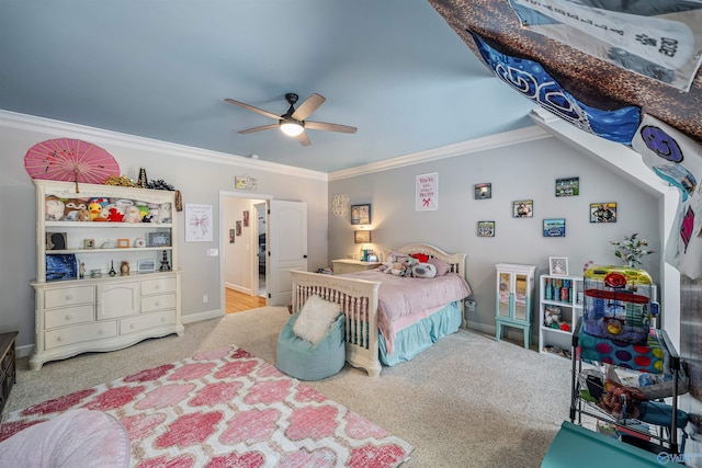 carpeted bedroom with crown molding, a ceiling fan, and baseboards