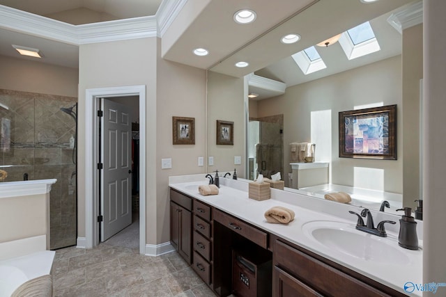 907 Binding Br NW, Huntsville, AL 35806 - full bath with a skylight, a stall shower, double vanity, a garden tub, and crown molding