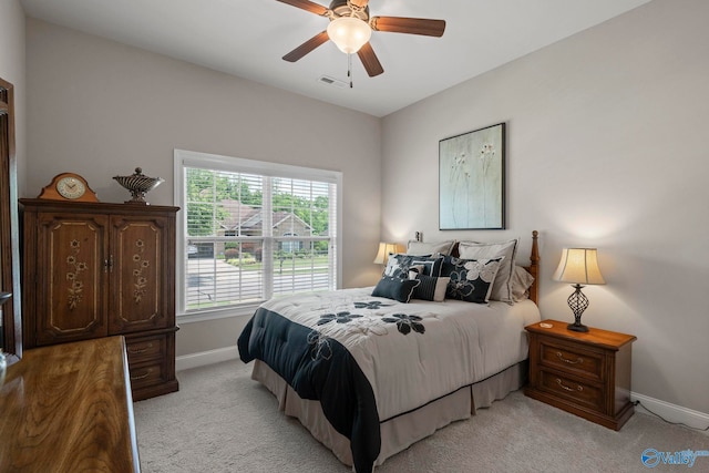 907 Binding Br NW, Huntsville, AL 35806 - bedroom featuring light colored carpet and a ceiling fan