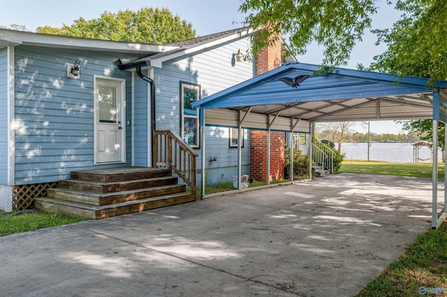 220 County Road 564, Leesburg, AL 35983 - view of vehicle parking with driveway, a water view, and a detached carport
