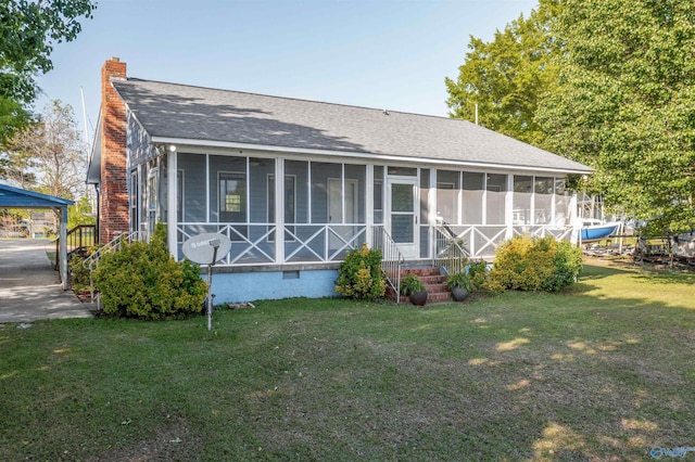 220 County Road 564, Leesburg, AL 35983 - rear view of property with a lawn, a sunroom, and a shingled roof