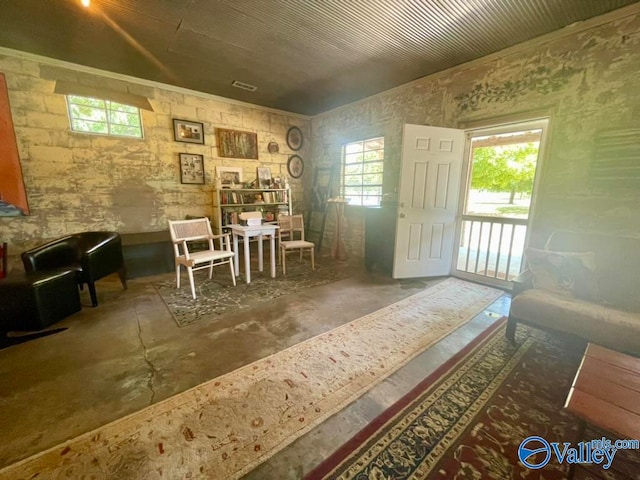 unfurnished room featuring concrete floors