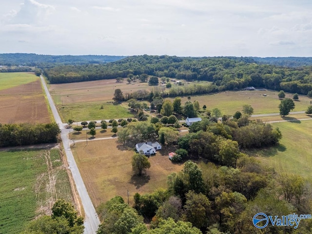 birds eye view of property featuring a rural view