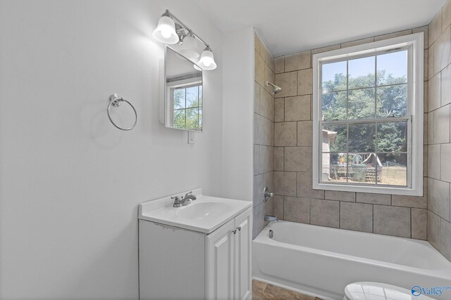 spare room with plenty of natural light, dark hardwood / wood-style floors, and a textured ceiling