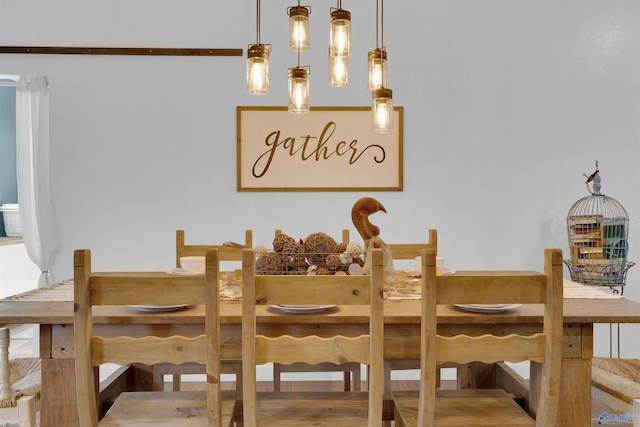 dining room with hardwood / wood-style floors