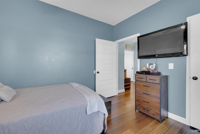 bedroom featuring dark hardwood / wood-style floors