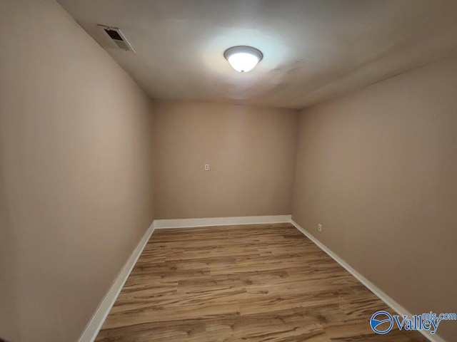 spare room with light wood-type flooring