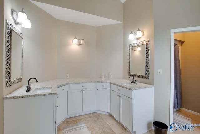 14850 Creek Ln, Athens, AL 35613 - bathroom featuring double vanity and tile patterned floors