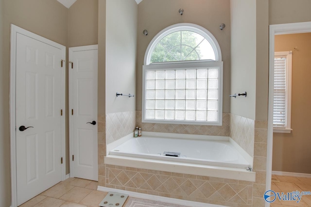 14850 Creek Ln, Athens, AL 35613 - bathroom with a bath and tile patterned flooring