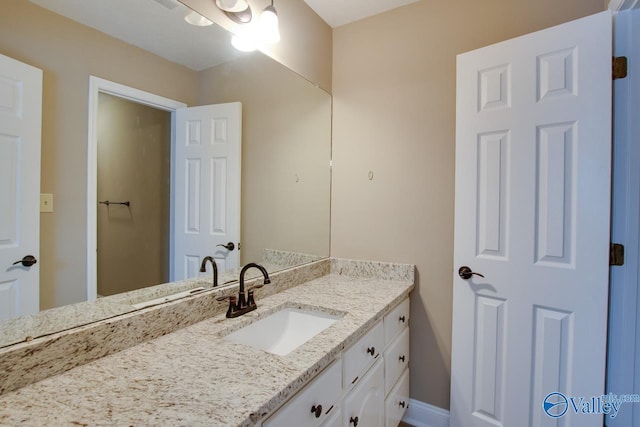 14850 Creek Ln, Athens, AL 35613 - bathroom featuring vanity and baseboards