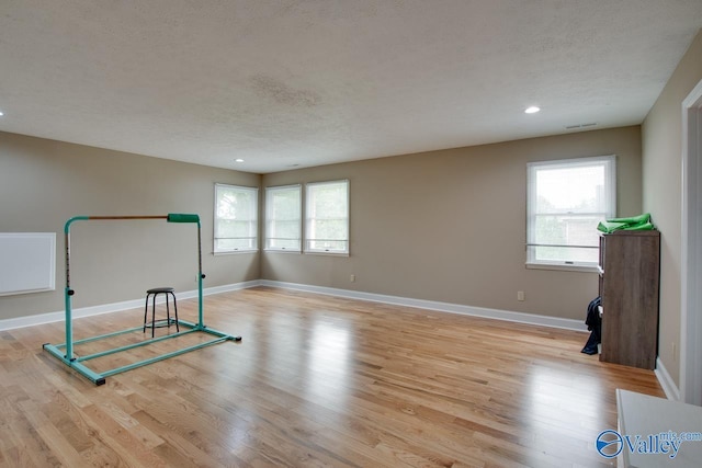14850 Creek Ln, Athens, AL 35613 - interior space with a textured ceiling, light wood finished floors, baseboards, and recessed lighting