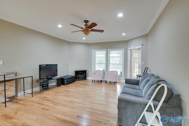 14850 Creek Ln, Athens, AL 35613 - living area with crown molding, light wood-type flooring, ceiling fan, recessed lighting, and baseboards