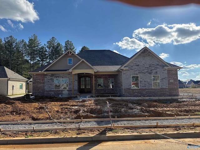 view of front of home with brick siding