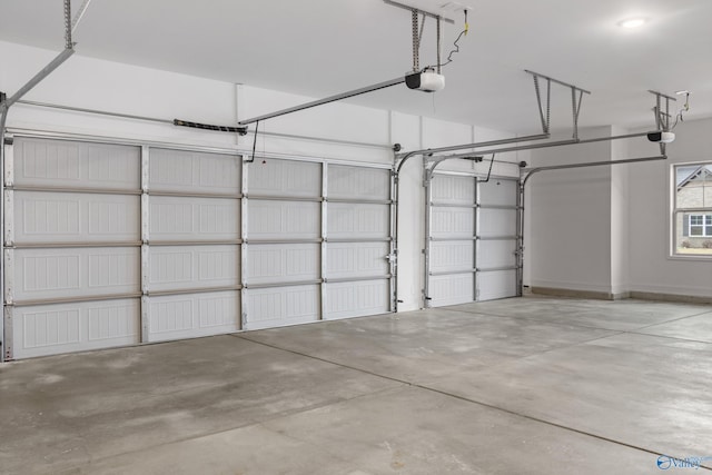 garage featuring a garage door opener