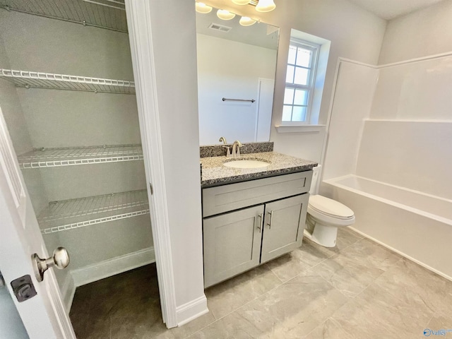 full bathroom featuring washtub / shower combination, visible vents, toilet, and vanity