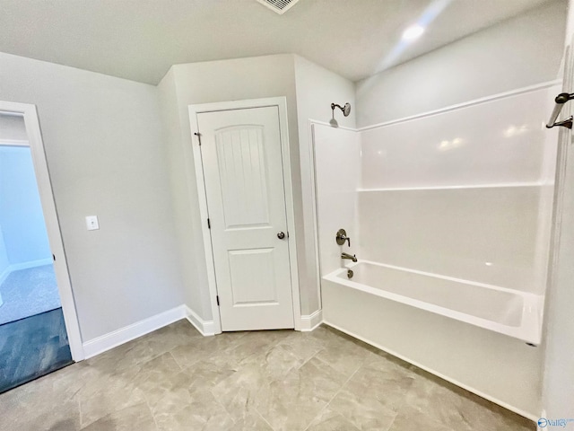 full bath featuring shower / tub combination, visible vents, and baseboards