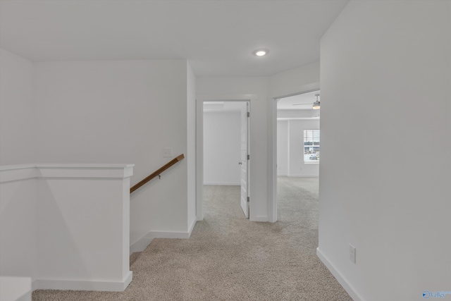 corridor with light carpet