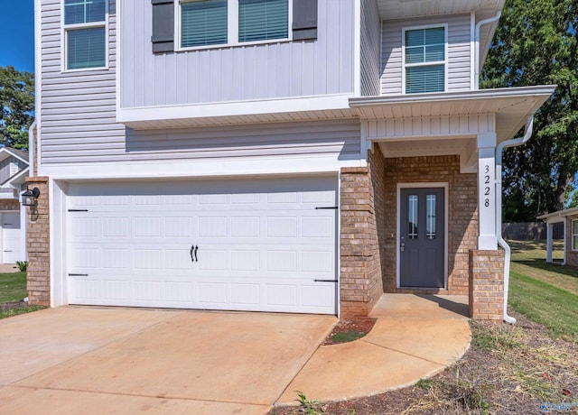 view of front of property featuring a garage