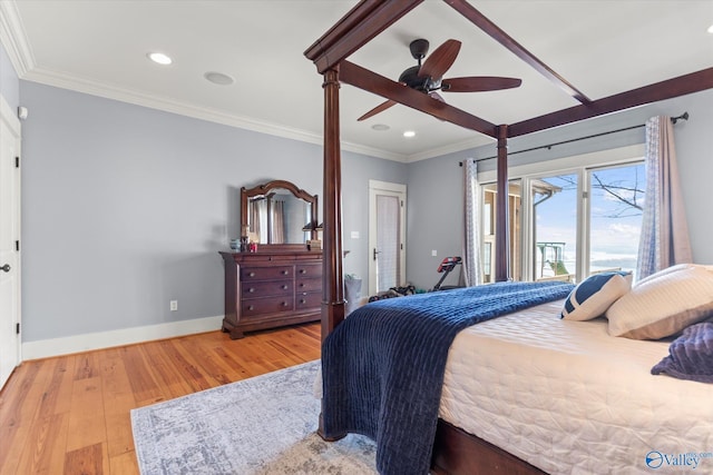 bedroom featuring recessed lighting, ornamental molding, baseboards, and wood finished floors