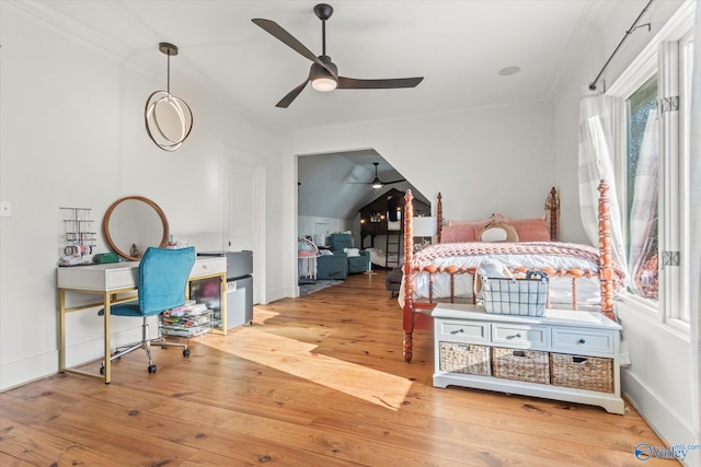 bedroom with hardwood / wood-style flooring, crown molding, baseboards, and ceiling fan