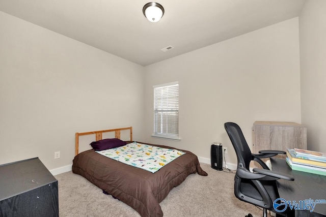 bedroom with carpet, visible vents, and baseboards