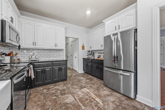11 Nandina Ln SW, Huntsville, AL 35824 - kitchen featuring appliances with stainless steel finishes, white cabinets, ornamental molding, decorative backsplash, and gray cabinetry
