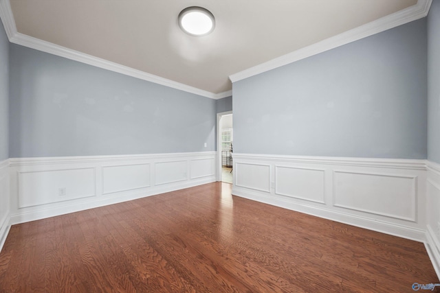 11 Nandina Ln SW, Huntsville, AL 35824 - empty room featuring ornamental molding, a wainscoted wall, and wood finished floors