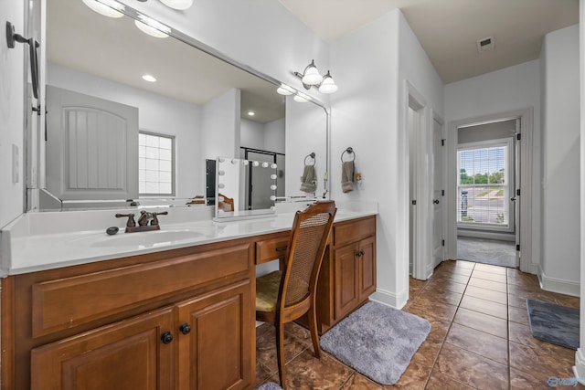 11 Nandina Ln SW, Huntsville, AL 35824 - bathroom with vanity, tile patterned flooring, a shower with shower door, baseboards, and recessed lighting