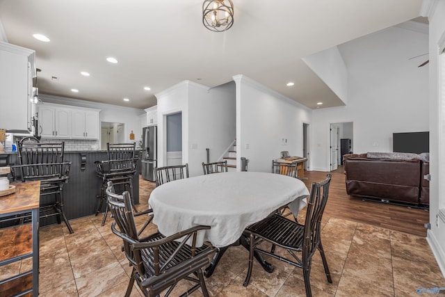 11 Nandina Ln SW, Huntsville, AL 35824 - dining area with crown molding, stairway, recessed lighting, and baseboards