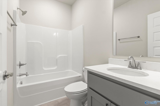 full bathroom featuring shower / bathing tub combination, vanity, toilet, and tile patterned floors