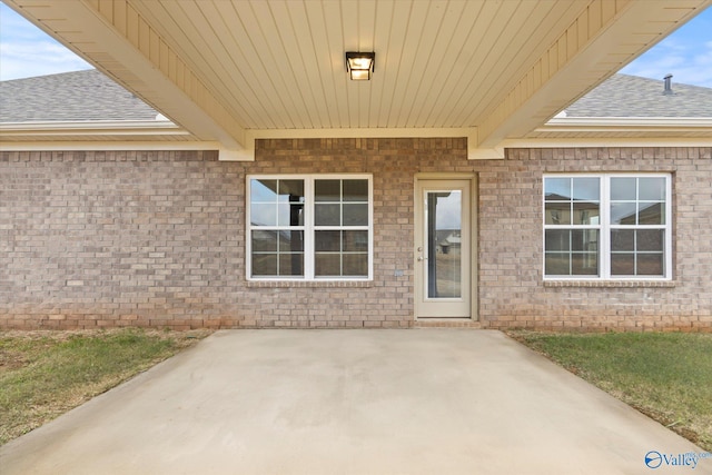 entrance to property with a patio area