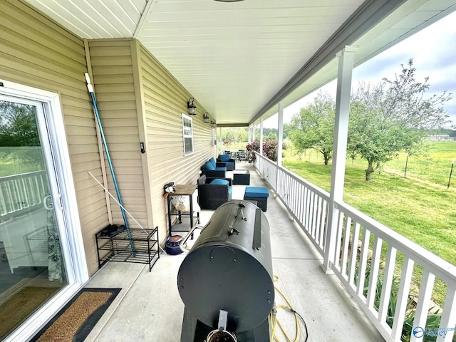 view of patio with a porch and an outdoor hangout area