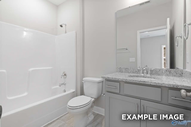 full bathroom with vanity, toilet, and shower / bath combination