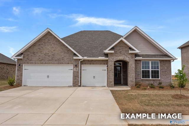 craftsman inspired home with a garage