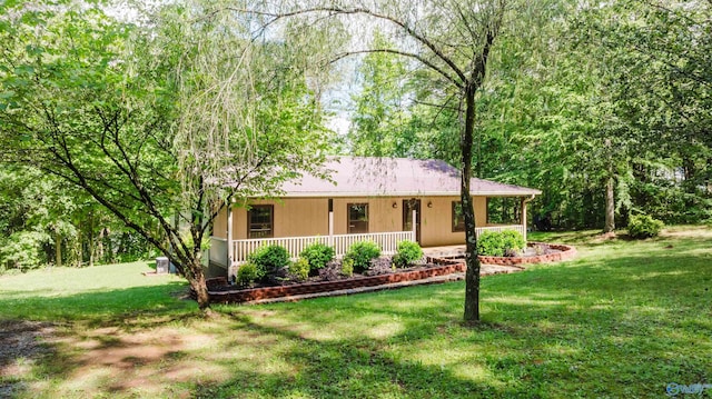 single story home with a porch and a front lawn