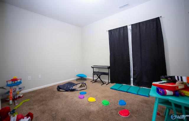 302 Meredith Dr, Muscle Shoals, AL 35661 - game room with carpet and baseboards