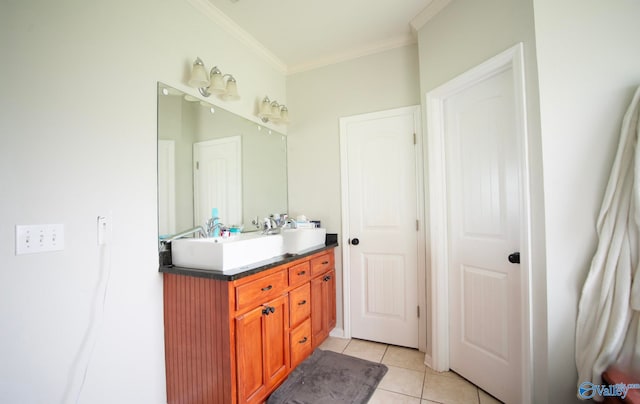 302 Meredith Dr, Muscle Shoals, AL 35661 - bathroom featuring vanity, ornamental molding, and tile patterned flooring