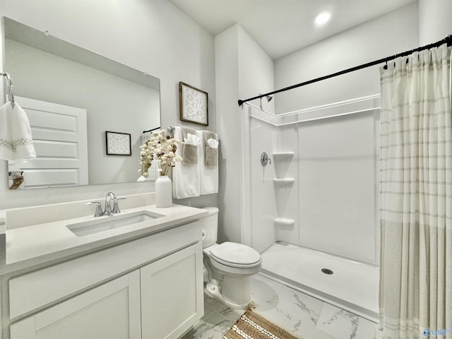 bathroom featuring a shower with curtain, marble finish floor, vanity, and toilet