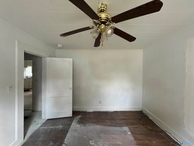 empty room featuring hardwood / wood-style flooring and ceiling fan