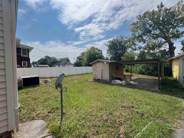 view of yard with a patio area and an outdoor structure